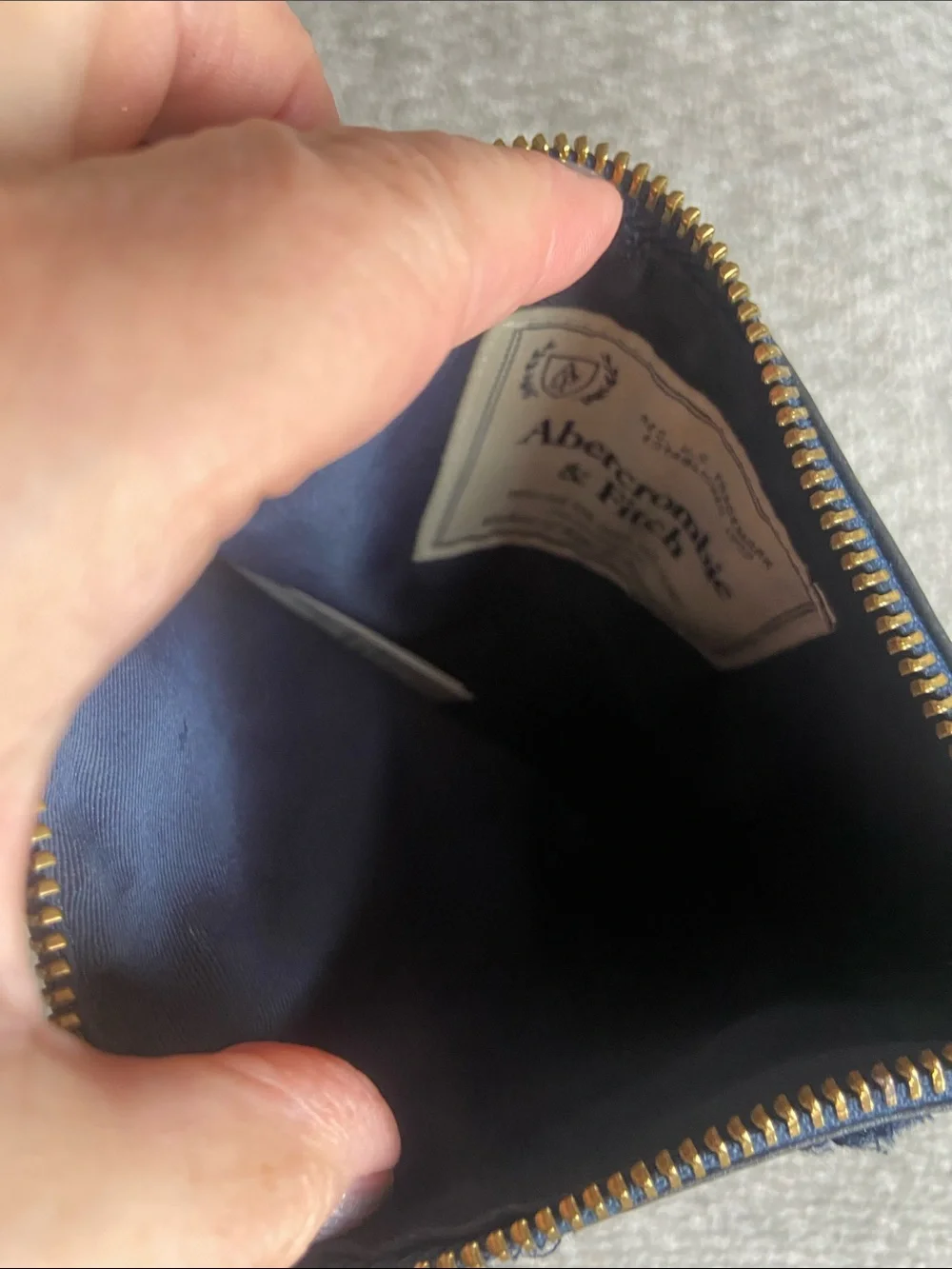 Abercrombie & Fitch Navy Pom-Pom Wristlet Clutch